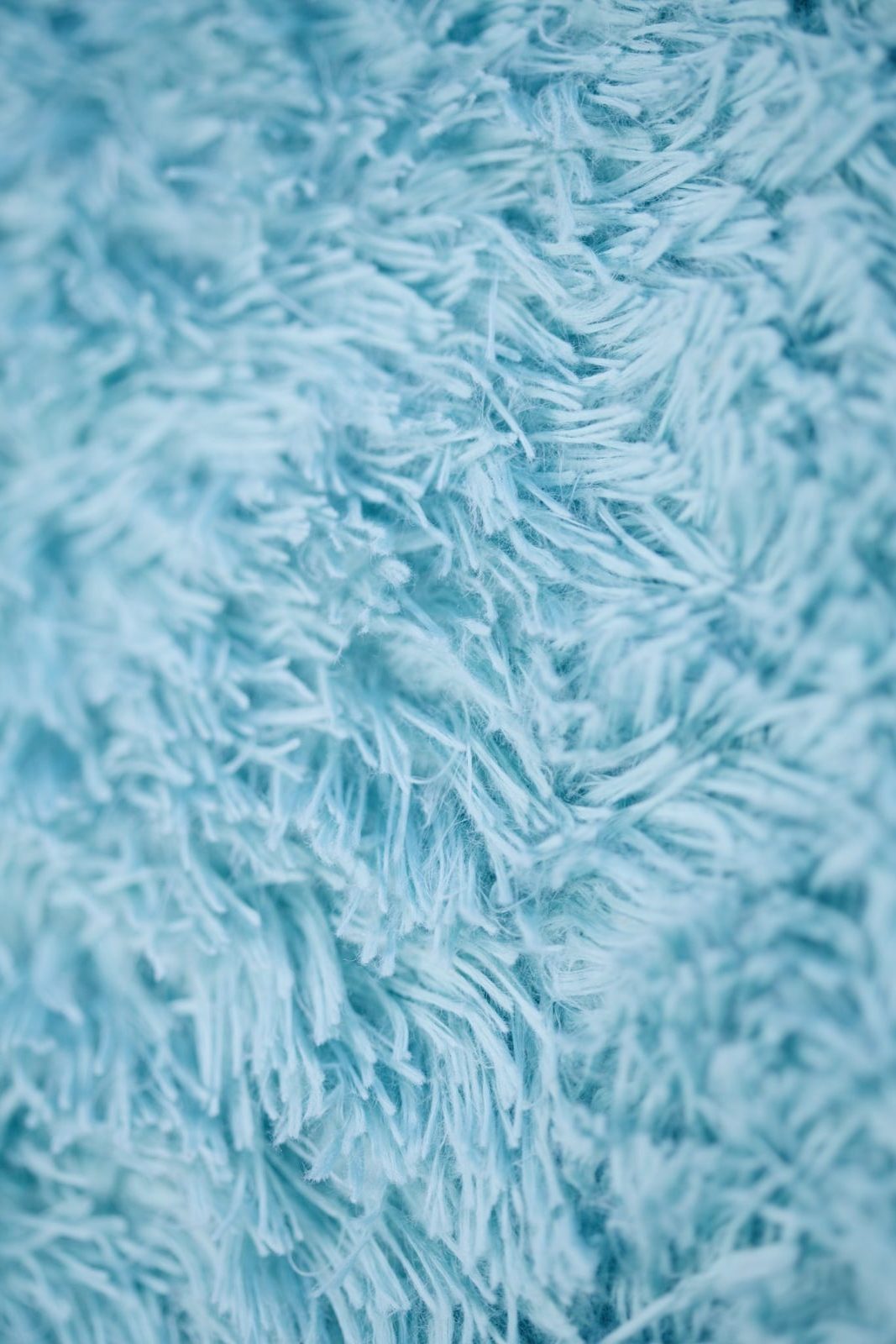 closeup photography of blue textile